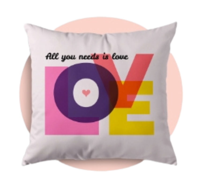 Decorative pillow with colorful 'LOVE' design and text on a pink background
